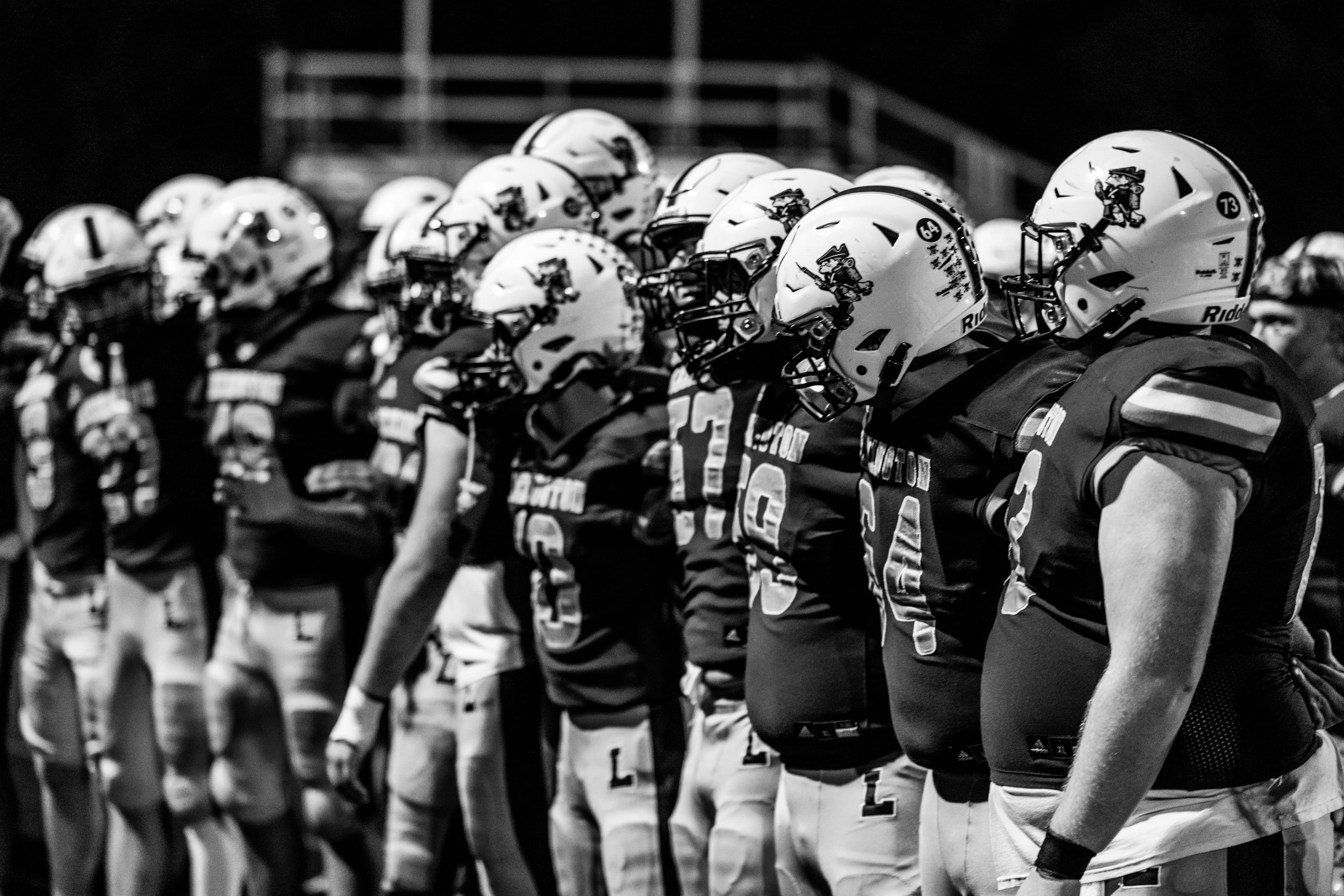 Football team lined up at the line of scrimmage