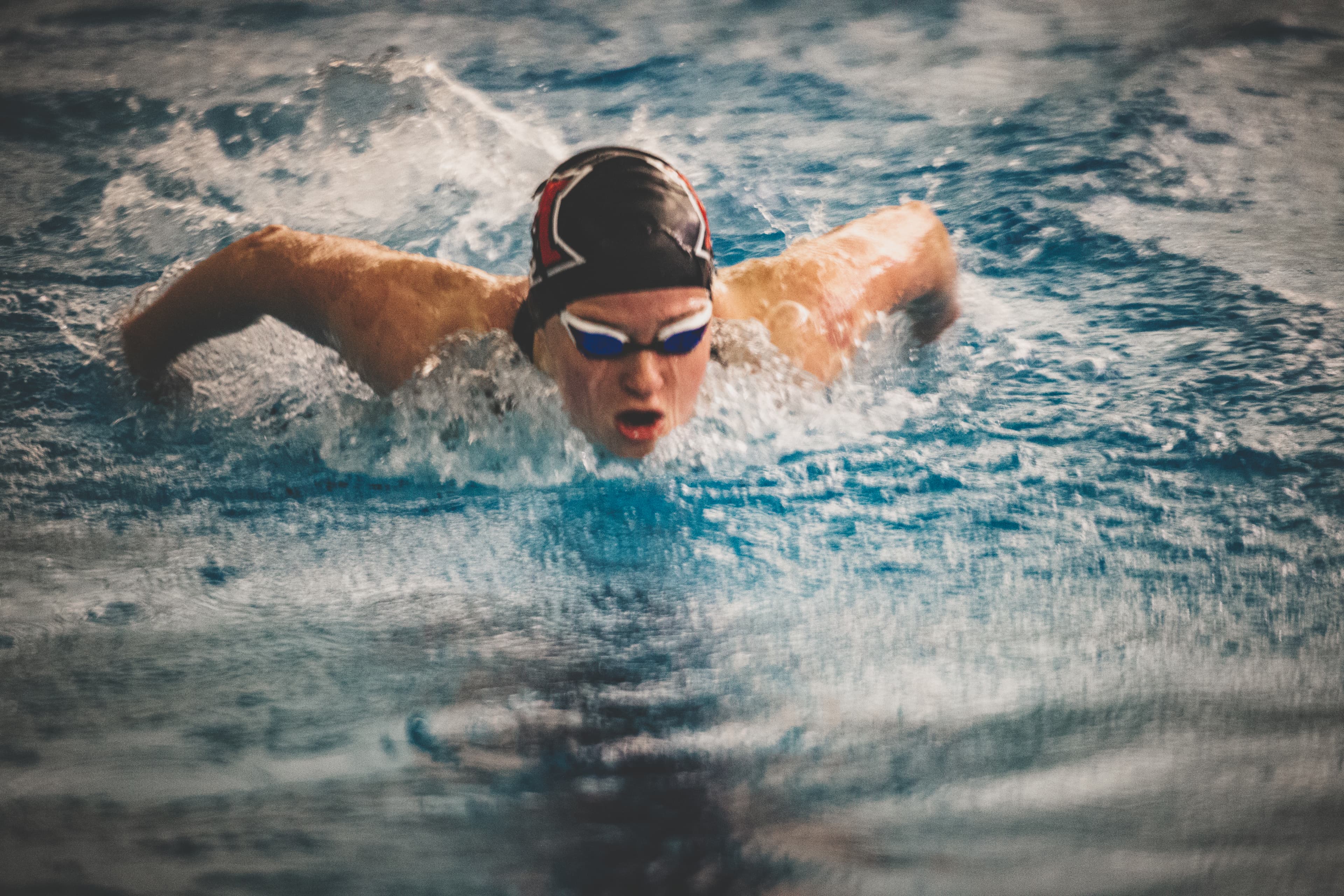 Swimmer in butterfly stroke